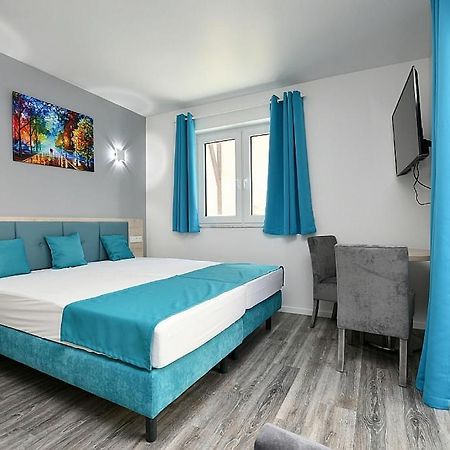 City-Hotel Zuffenhausen - Apartments สตุตการ์ต ภายนอก รูปภาพ